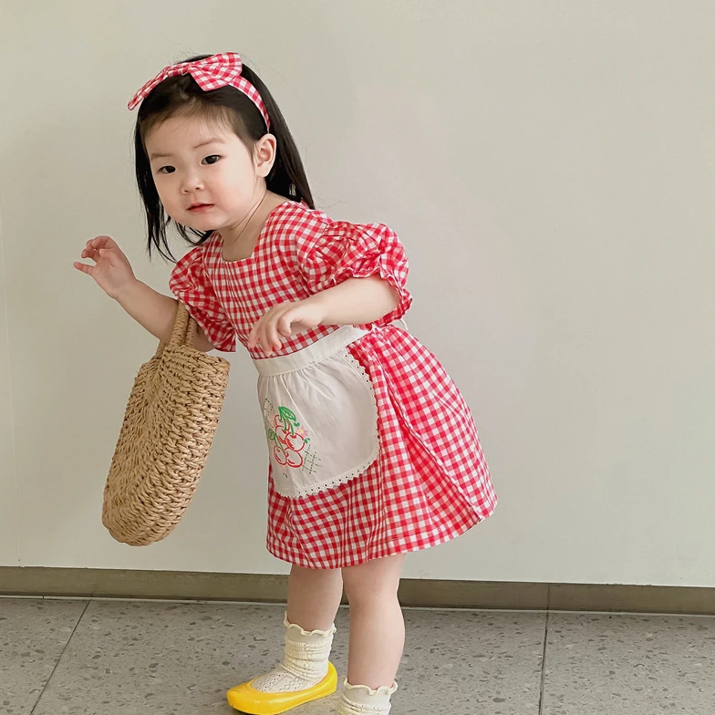 Лятно нова рокля за момичета, червено памучно рокля в клетка с пищни ръкави, модни корейската версия, игрив, сладък, гъвкав детски дрехи Изображение 0